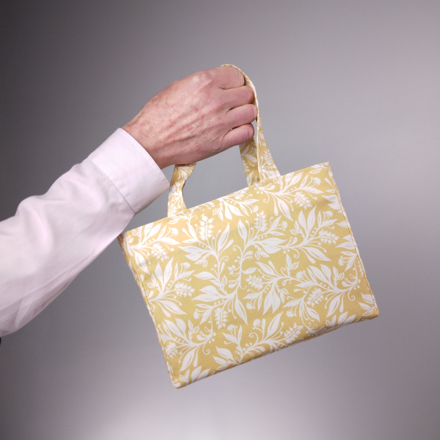 Hand held mini tote bag