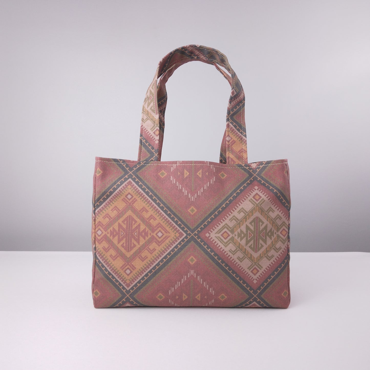 Mini tote bag with red, orange, and beige diamond kilim pattern