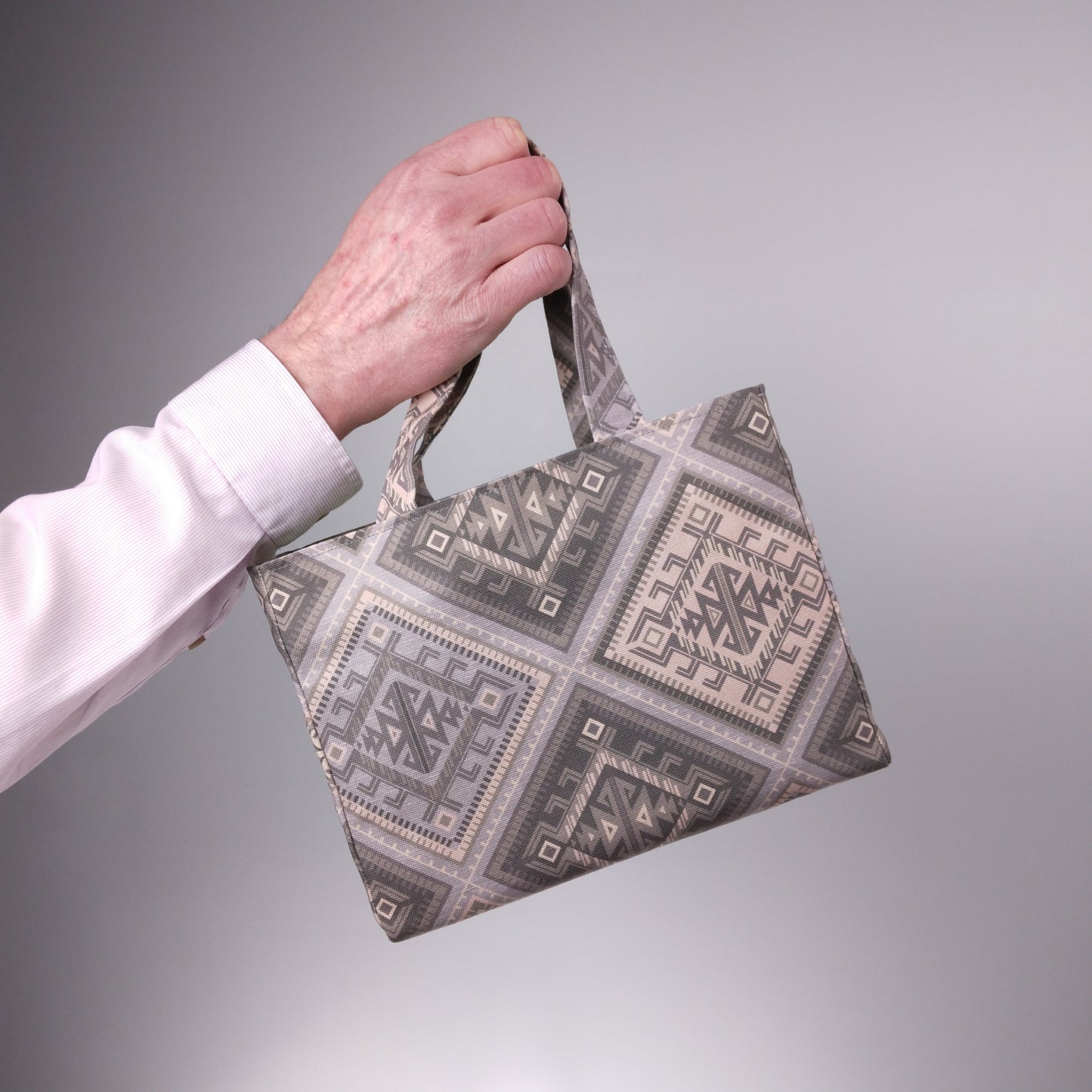 Hand held mini tote bag