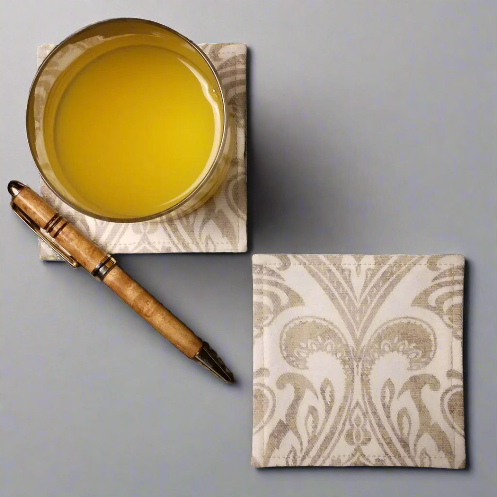 Square coasters with natural colour damask print on off-white background