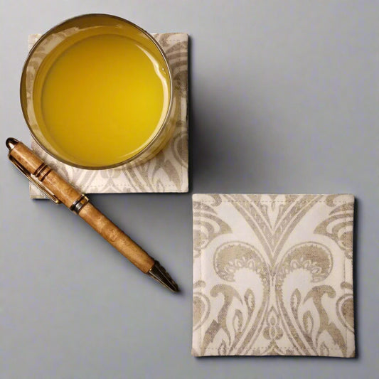Square coasters with natural colour damask print on off-white background