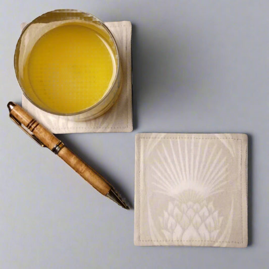 Square coasters with off-white thistle pattern on ivory colour background