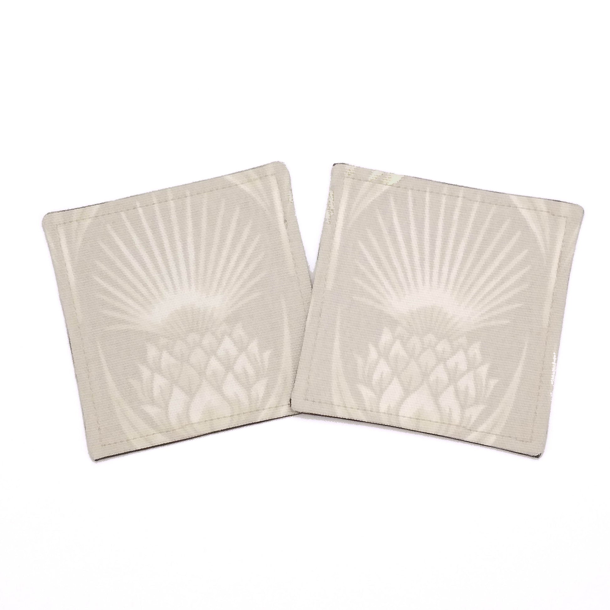 Square coasters with off-white thistle pattern on ivory colour background