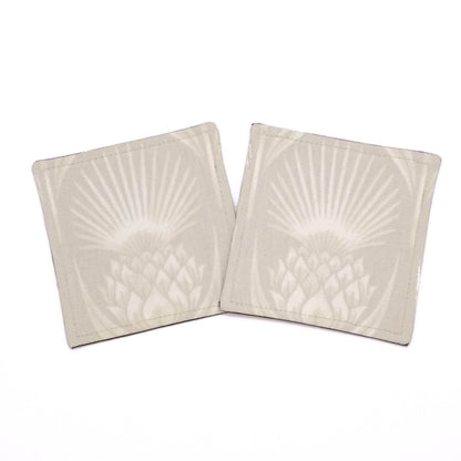 Square coasters with off-white thistle pattern on ivory colour background