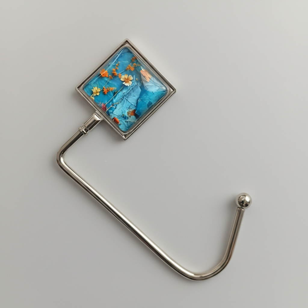 Glass cabochon purse hook with colourful floral collage image and metal hook