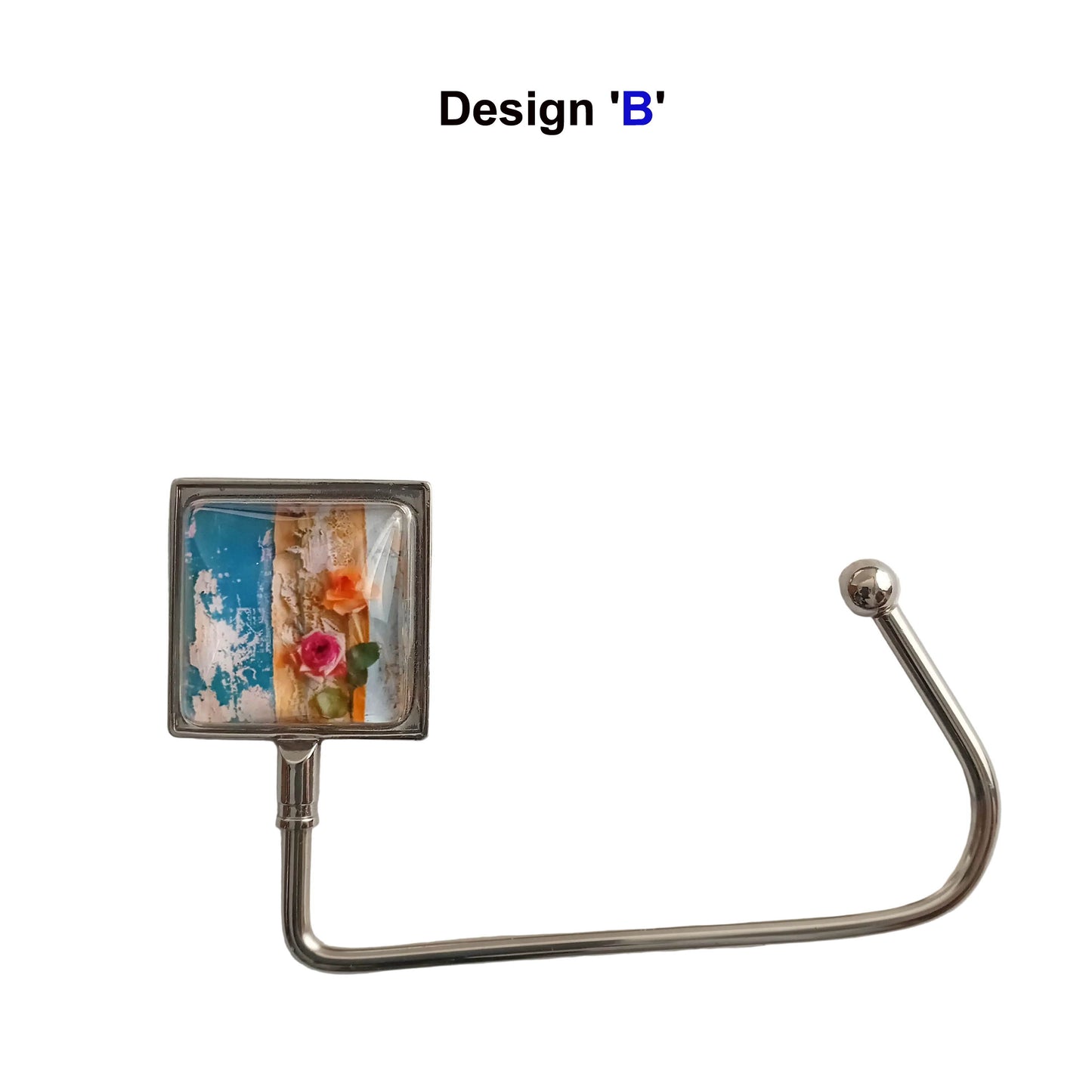 Handbag hook with glass cabochon and colourful blue and orange floral collage image, and metal hook