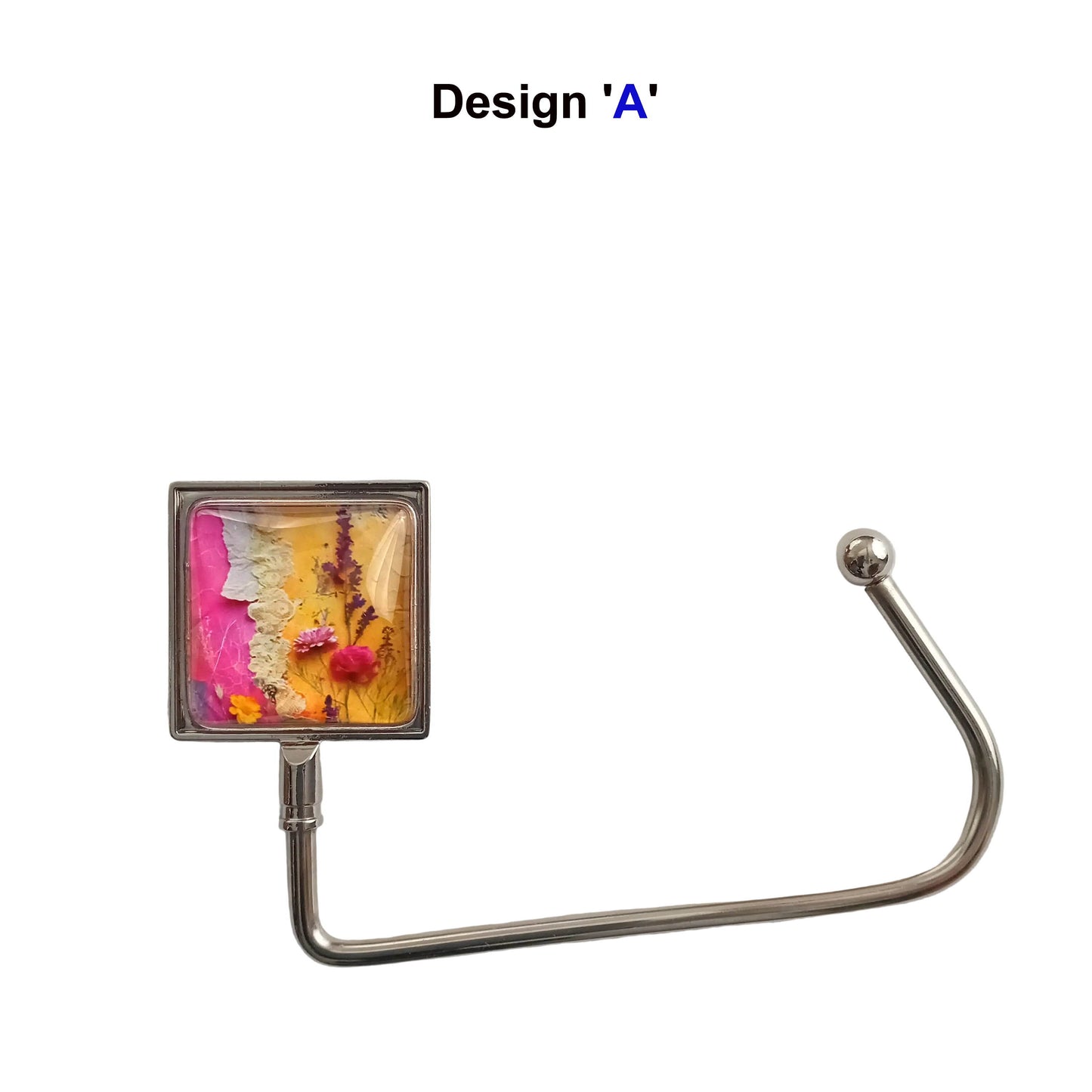 Handbag hook with glass cabochon and colourful pink and yellow floral collage image, and metal hook