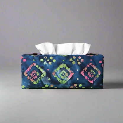 Batik printed cotton rectangle tissue box cover with tie dye magenta and green diamond design on blue background