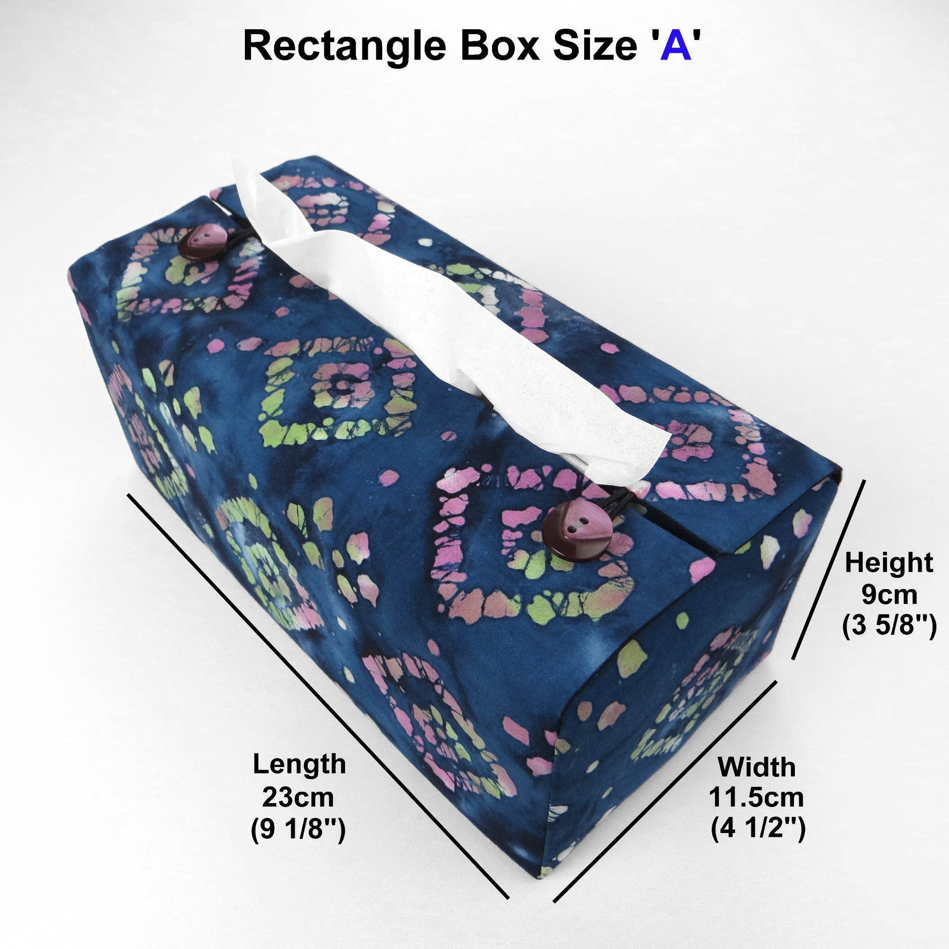 Batik printed cotton rectangle tissue box cover with tie dye magenta and green diamond design on blue background