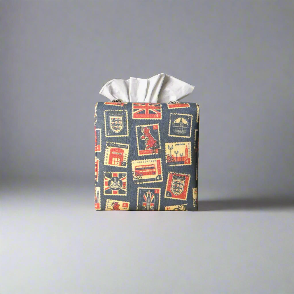 Printed cotton square tissue box cover with British stamps design on pale navy background