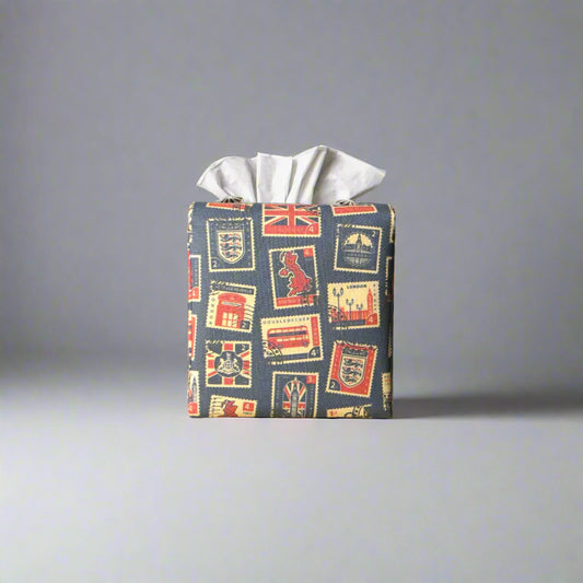 Printed cotton square tissue box cover with British stamps design on pale navy background