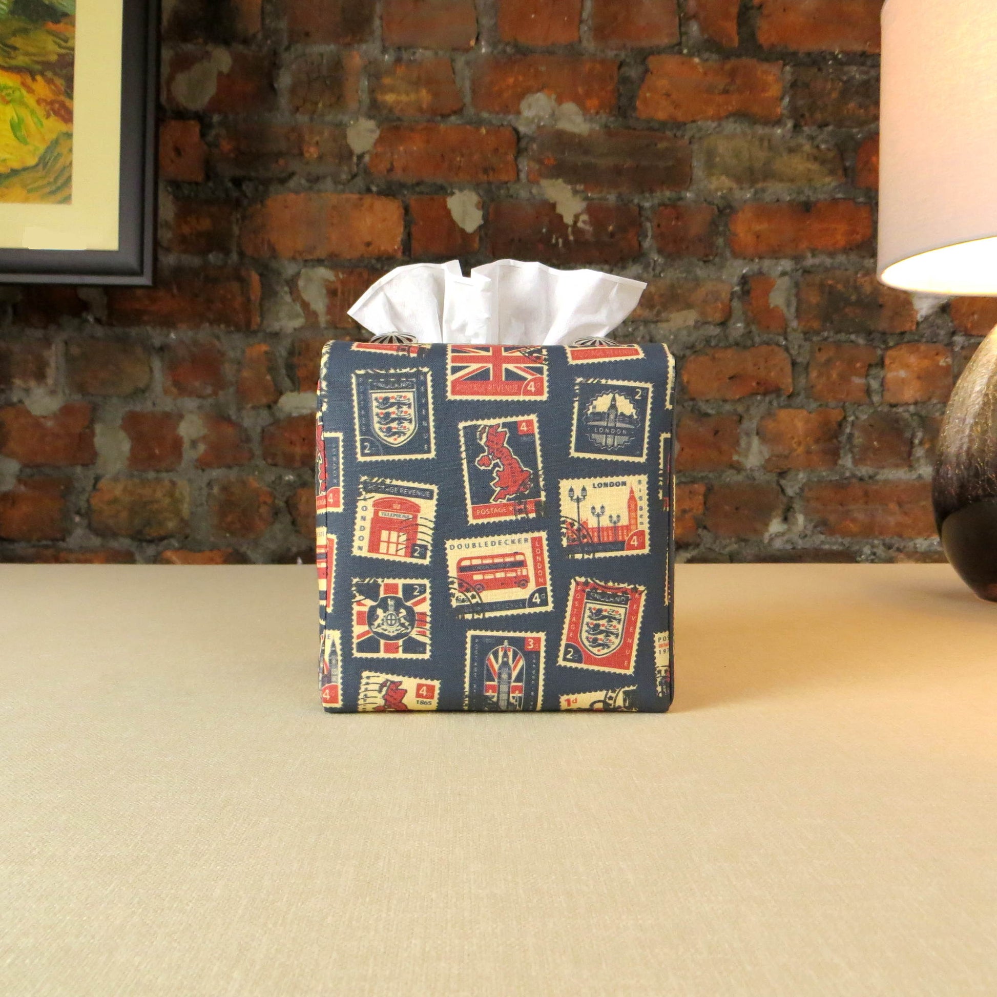Printed cotton square tissue box cover with British stamps design on pale navy background