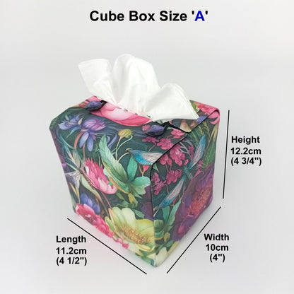 A handmade square cotton tissue box cover with a vibrant multicolour floral and dragonfly pattern, shown with product measurements.