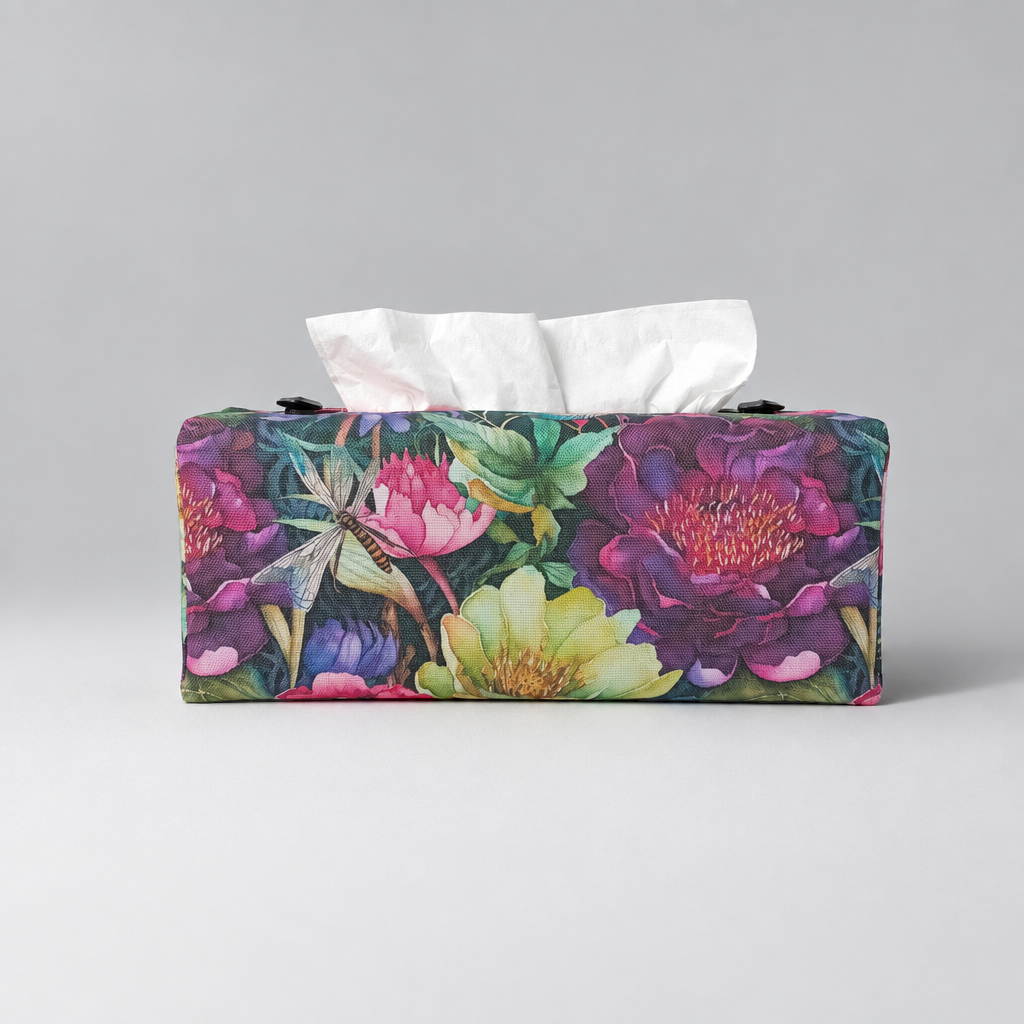 A handmade rectangular cotton tissue box cover with a colourful floral print featuring purple, pink, green, and yellow flowers, with dragonflies set against a neutral light grey background.