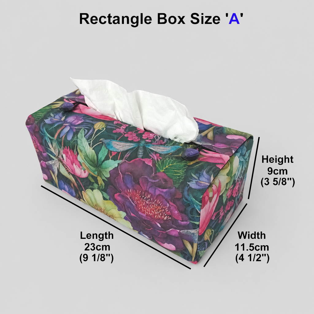 A handmade rectangular cotton tissue box cover with a vibrant multicolour floral print featuring pink, yellow, and purple flowers on a green background, with dragonflies.