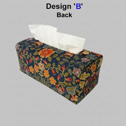 Reverse side of a rectangular tissue box cover with a dark navy blue background and an arts and crafts style floral pattern in orange, red, yellow, and green.