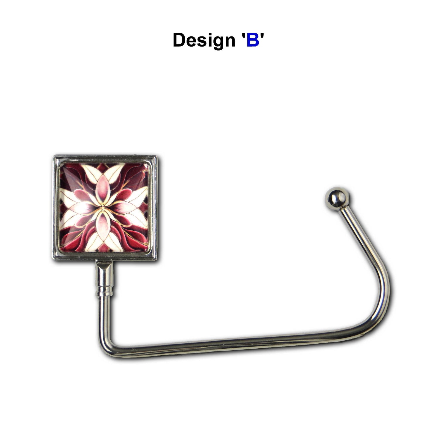 Handbag hook with glass domed image for hanging accessories on tables, ledges, and shelves