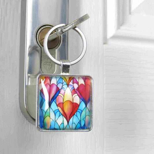 Keyring with a colourful glass domed image
