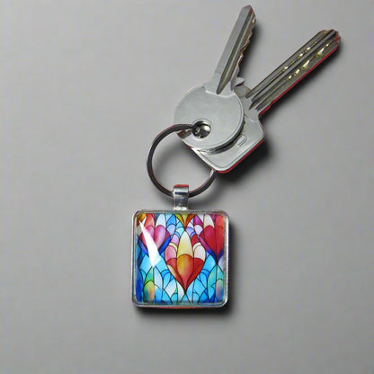 Keyring with a colourful glass domed image