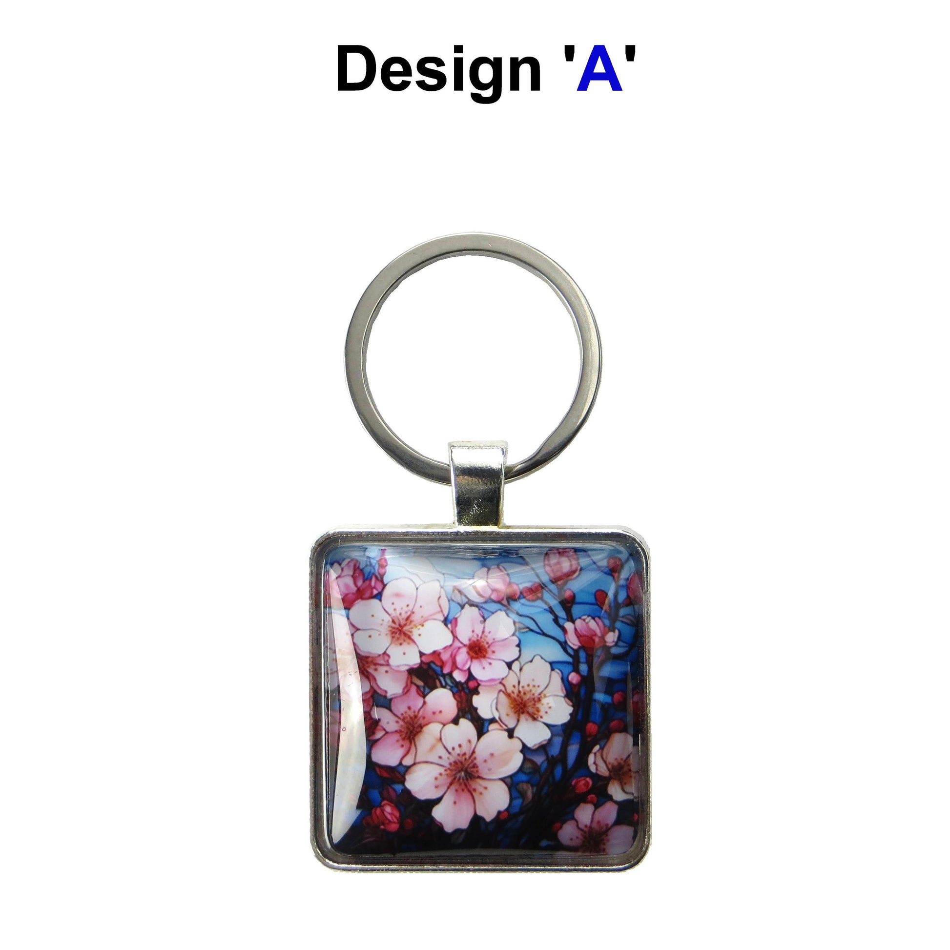 Keyring with a colourful glass domed image