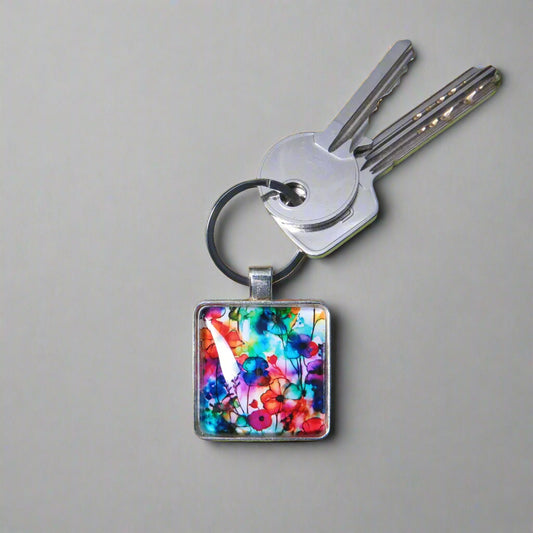 Keyring with a colourful glass domed image