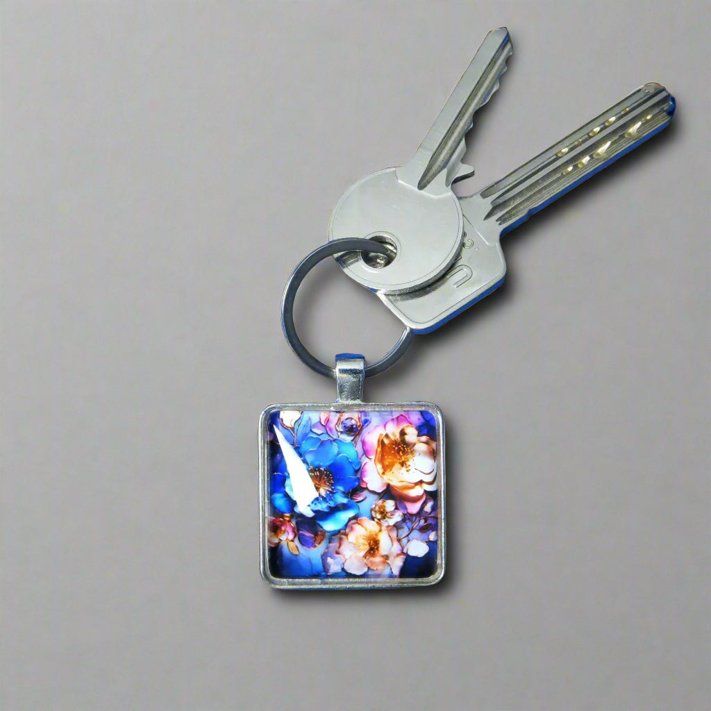 Keyring with a colourful glass domed image