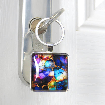 Keyring with a colourful glass domed image