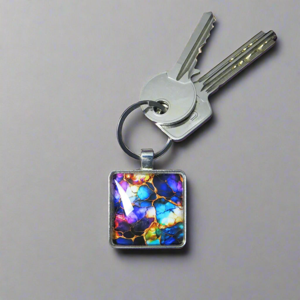 Keyring with a colourful glass domed image
