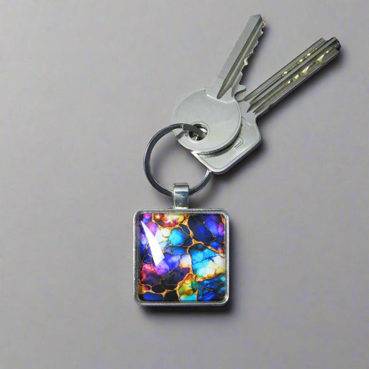 Keyring with a colourful glass domed image
