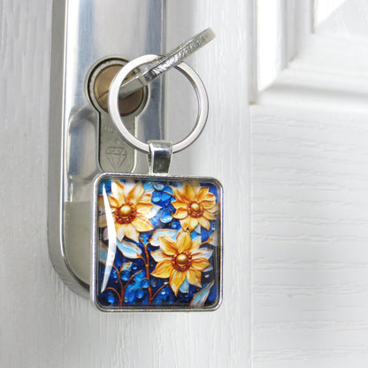 Keyring with a colourful glass domed image