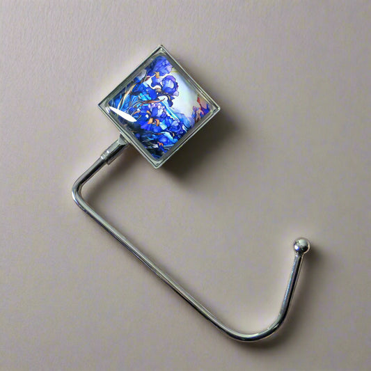 Handbag hook with glass domed image for hanging accessories on tables, ledges, and shelves