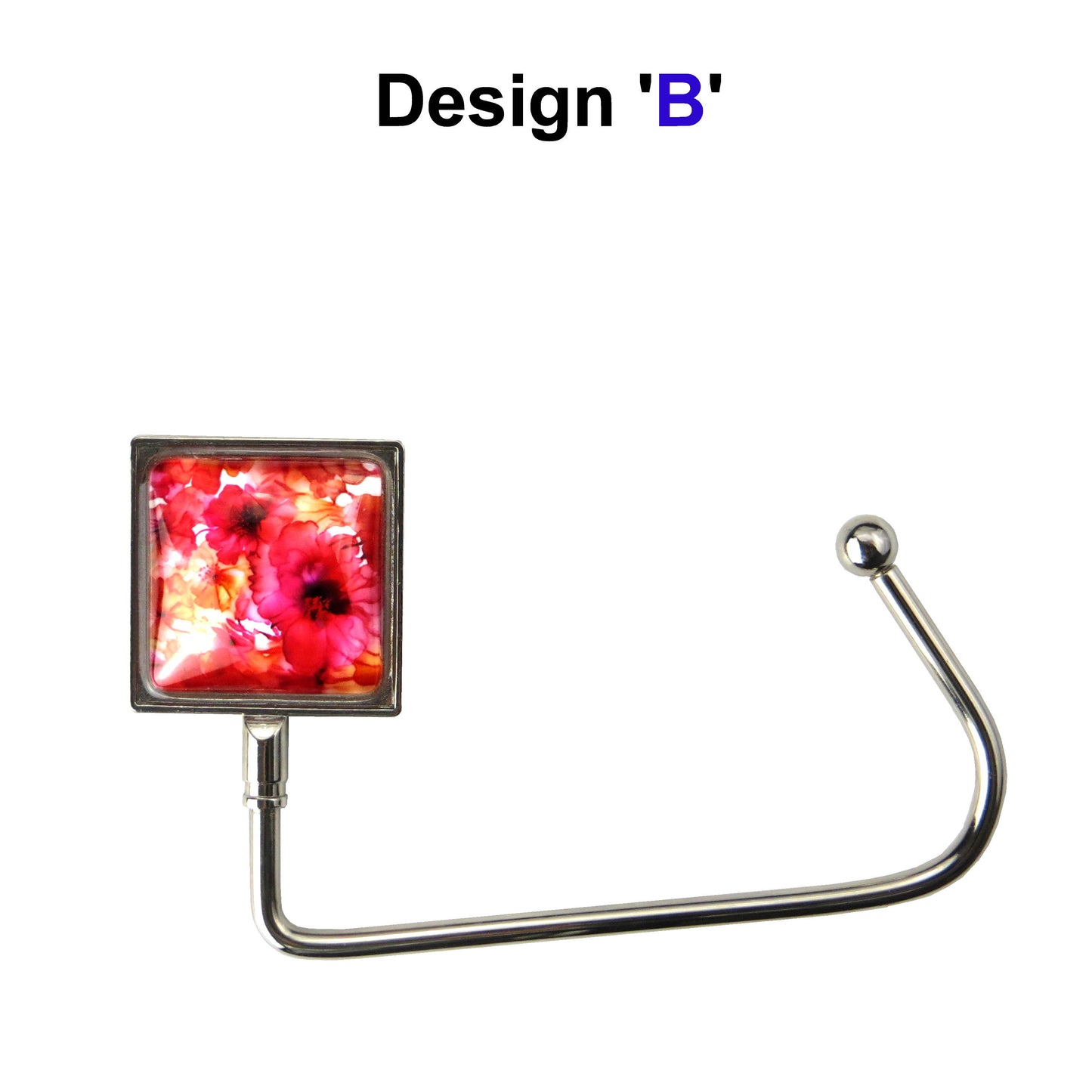 Handbag hook with glass domed image for hanging accessories on tables, ledges, and shelves