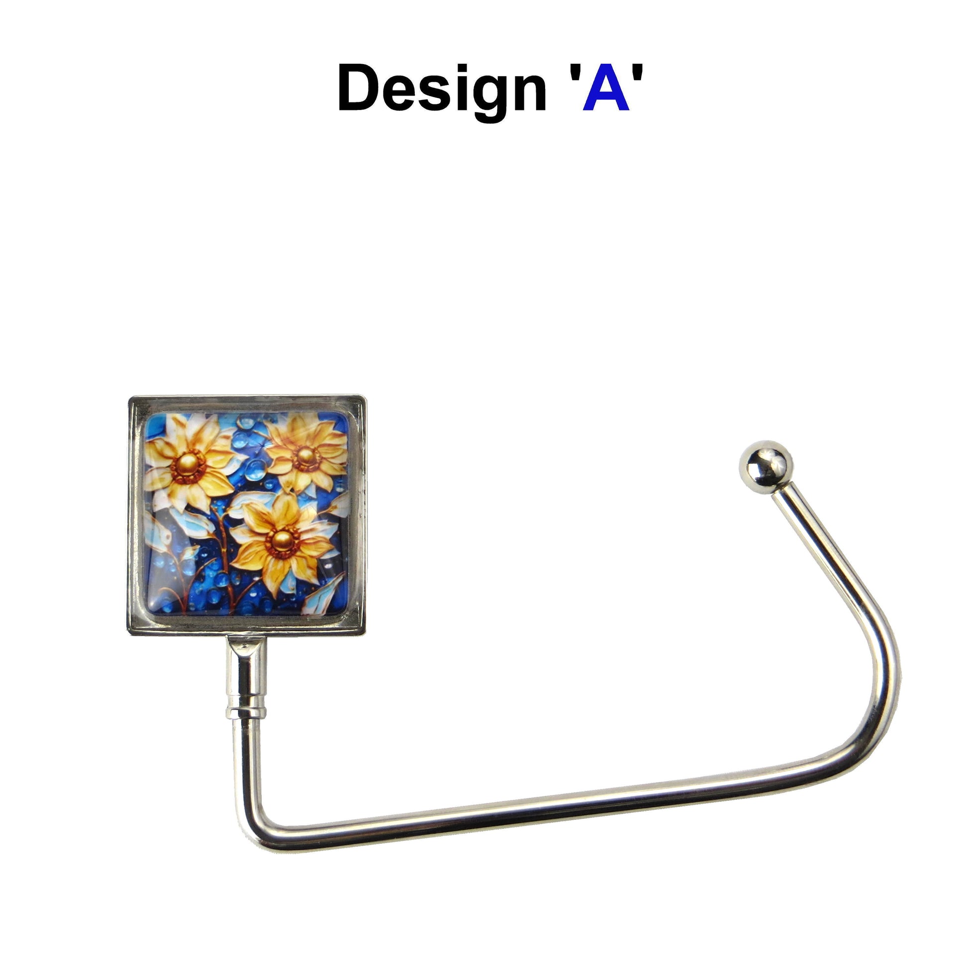 Handbag hook with glass domed image for hanging accessories on tables, ledges, and shelves