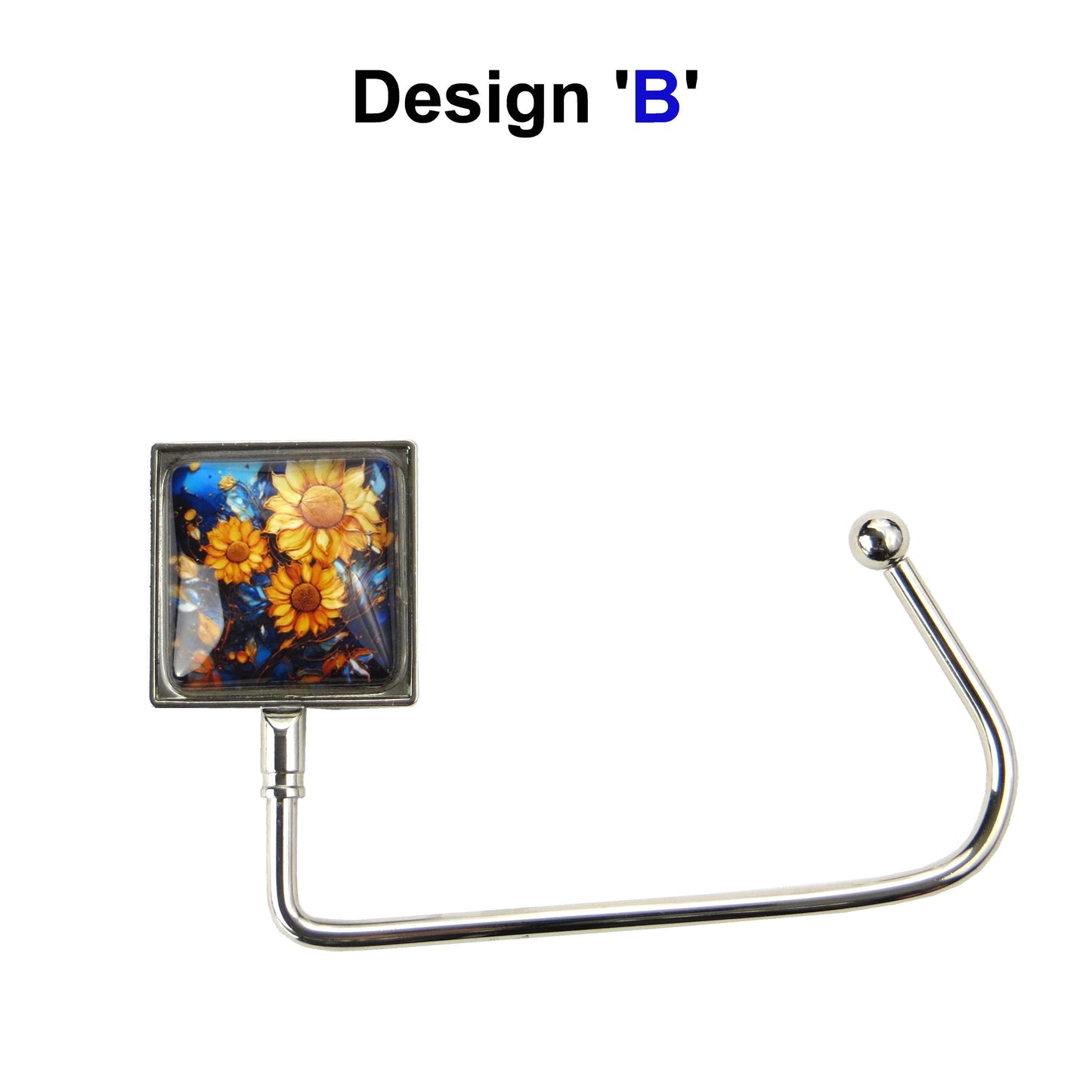 Handbag hook with glass domed image for hanging accessories on tables, ledges, and shelves