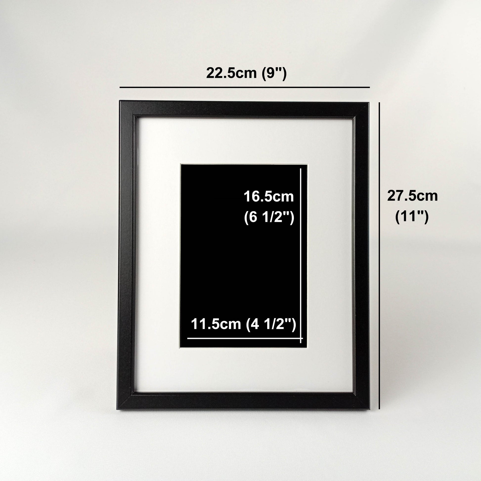 Framed fabric art with a single tree and mountain image