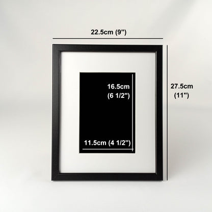 Framed fabric art with a single tree and mountain image