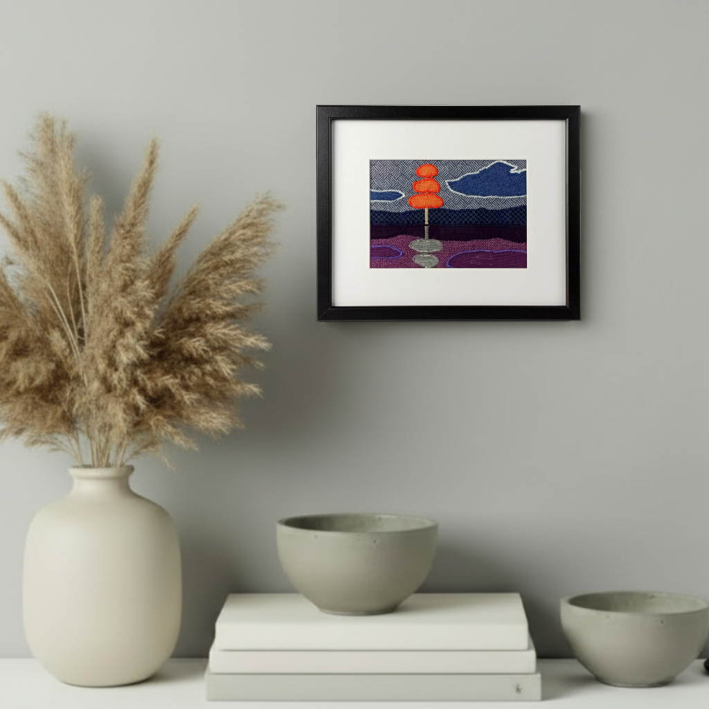 Framed fabric landscape scene with a stylised tree and lake