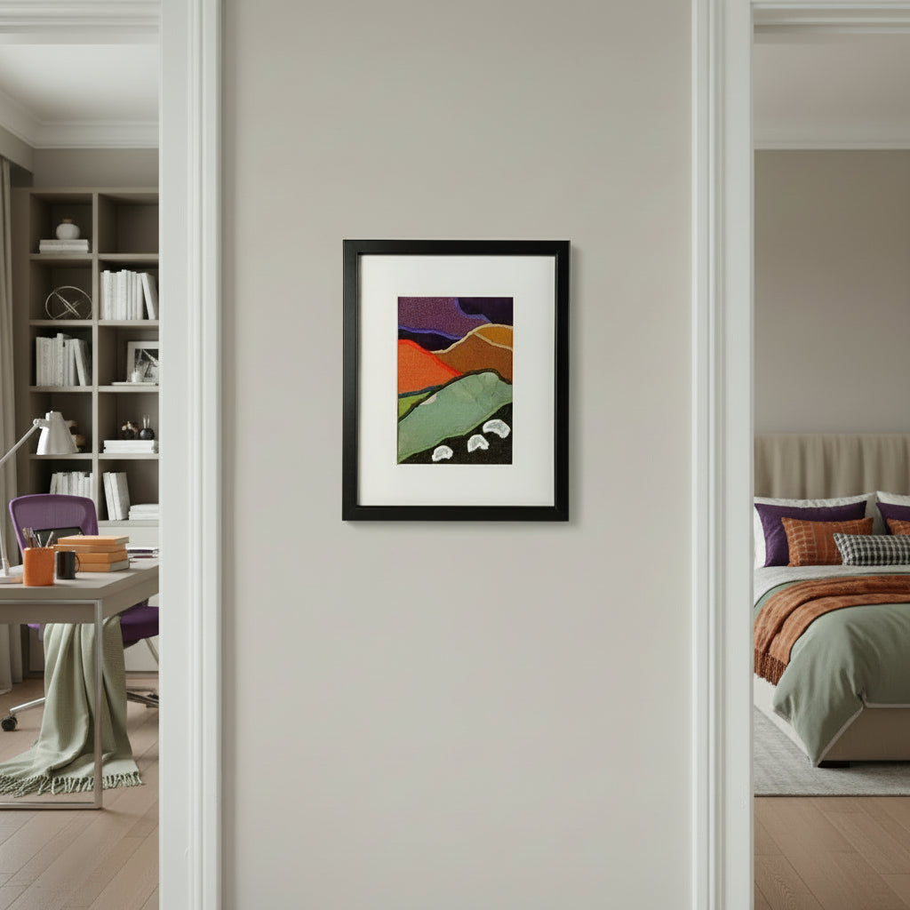 Framed fabric artwork with a hillside landscape featuring highland sheep