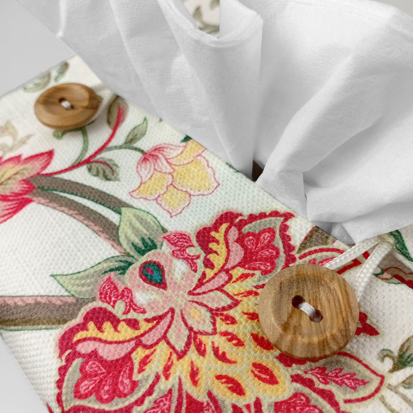 Cube tissue box cover with a colourful botanical design