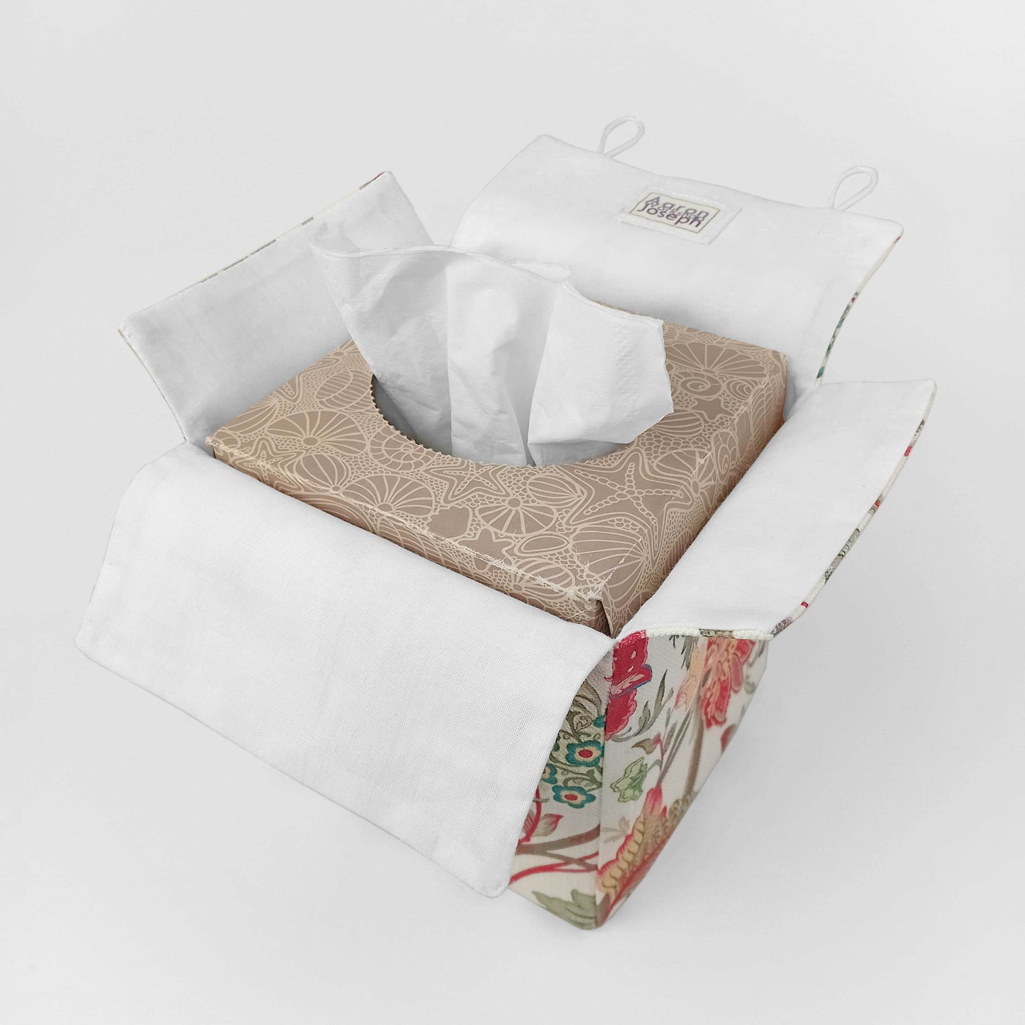 Cube tissue box cover with a colourful botanical design