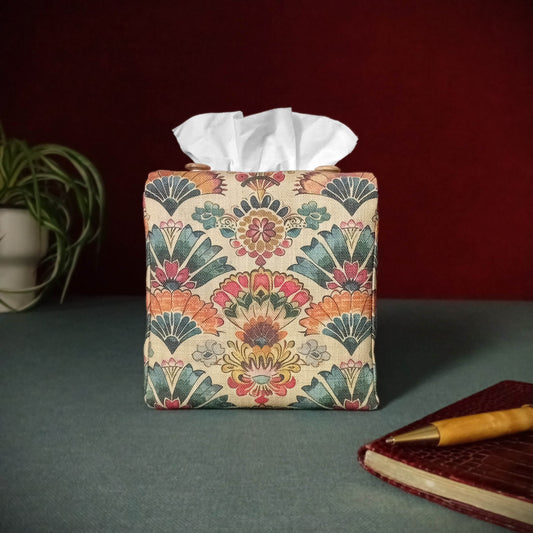 Cube tissue box cover that features a colourful folding fan design on an antiqued tan background