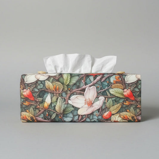 Linen rectangle tissue box cover with a lush garden pattern featuring magnolia blossoms and vines