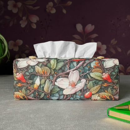 Linen rectangle tissue box cover with a pen, notebook, and plant