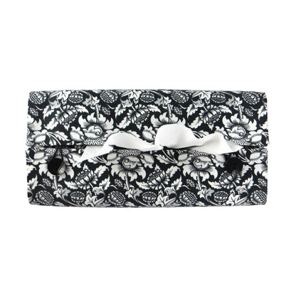 Rectangle tissue box cover with white flowering vine design on black background