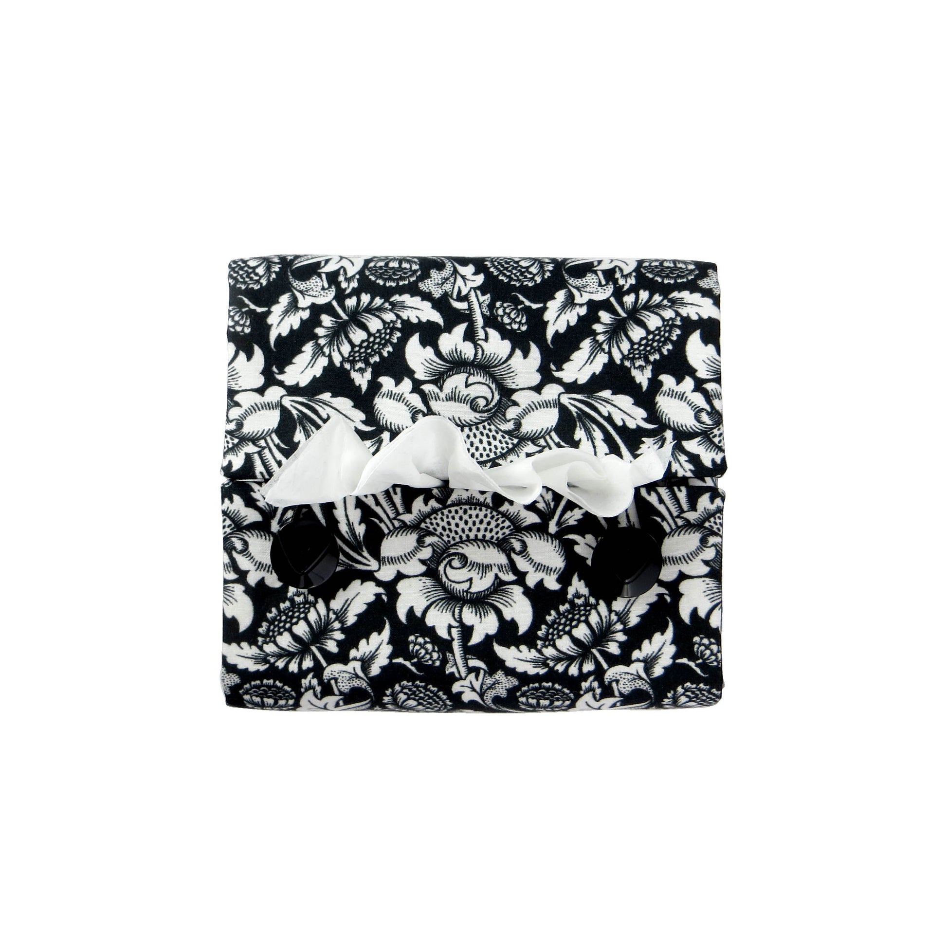 Square tissue box cover with white flowering vine design on black background