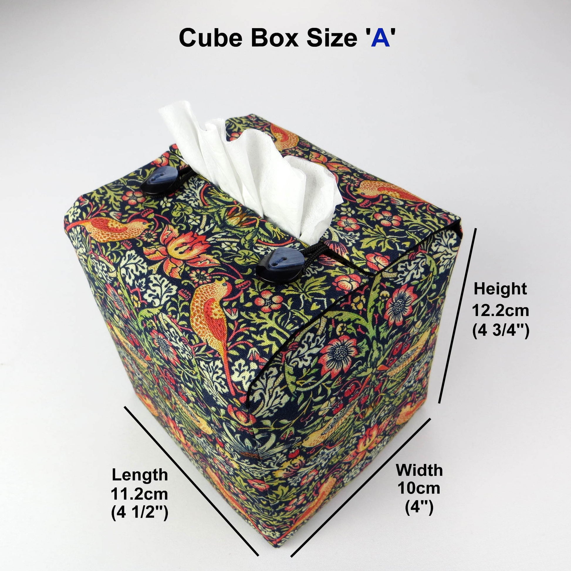 Square tissue box cover with birds and berries design on dark blue background