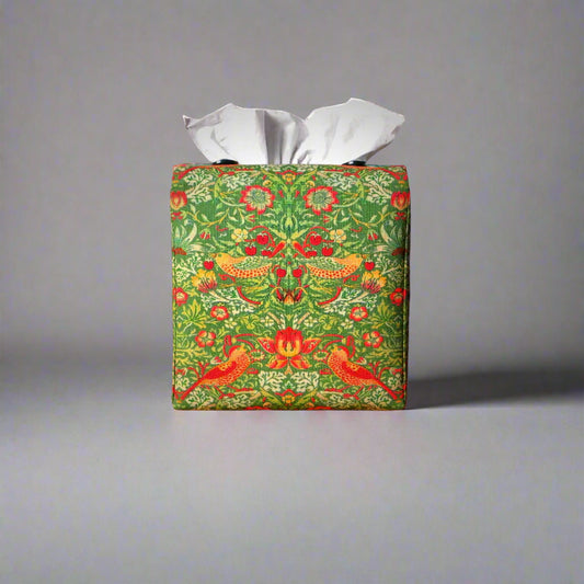 Square tissue box cover with birds and berries design on green background