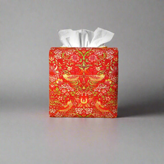 Square tissue box cover with birds and berries design on red background