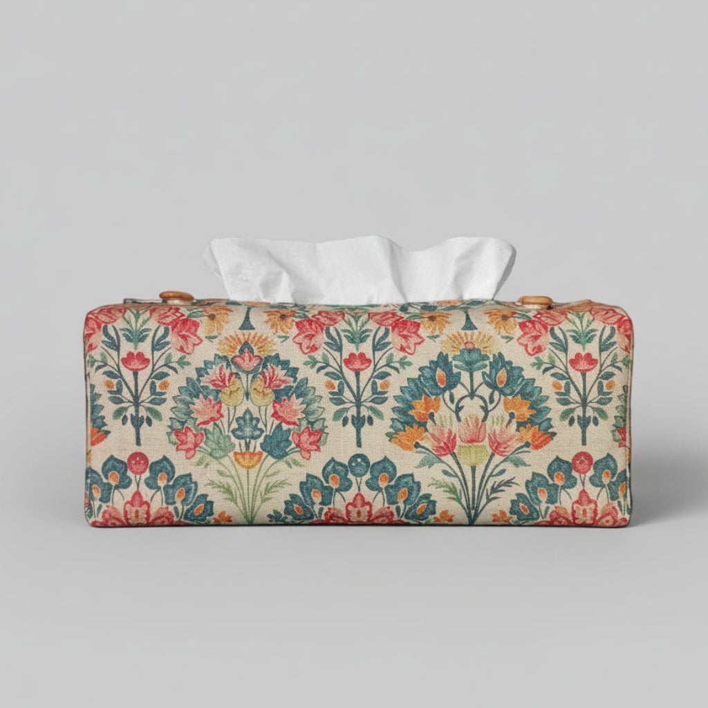Linen tissue box cover with a colourful floral bouquet pattern on an antiqued tan background