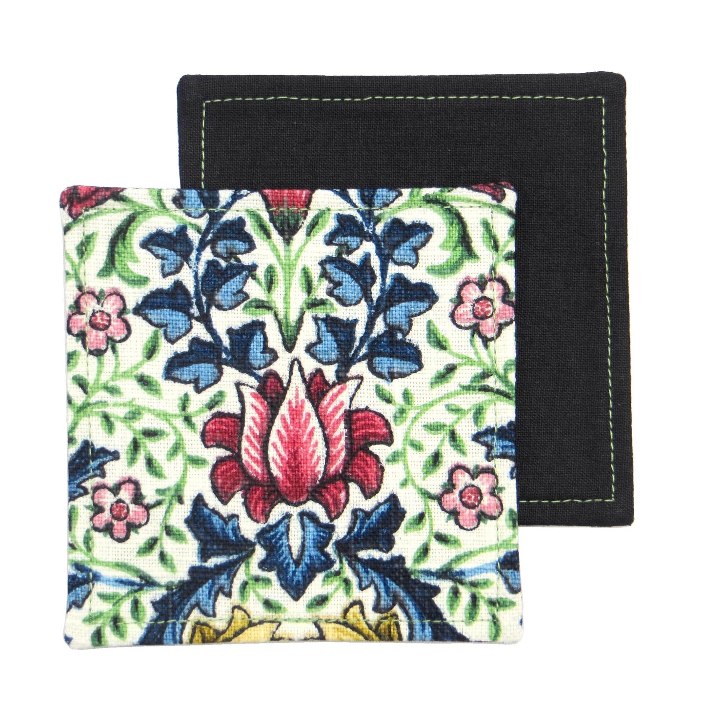 Square coasters with red, blue, green, and yellow flowers and leaves on off white background